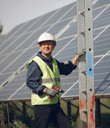 Worker installing solar panels